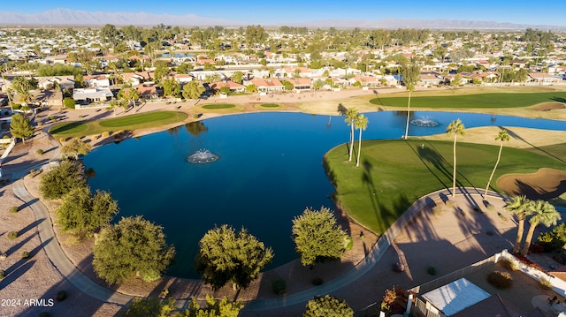 bird's eye view with a water and mountain view