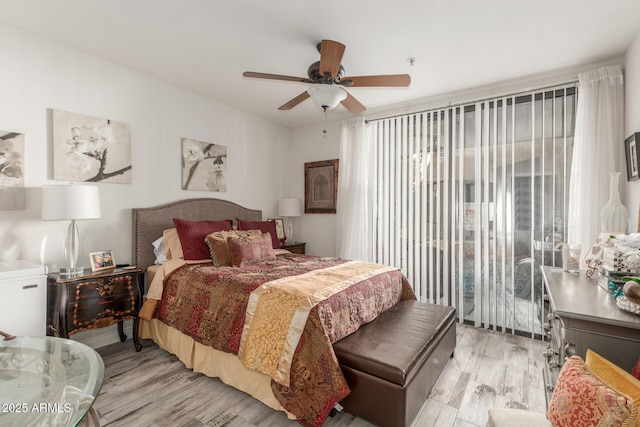 bedroom with ceiling fan, access to exterior, and light wood-type flooring