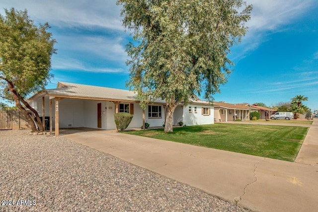 single story home with a carport and a front yard