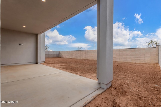 view of yard with a fenced backyard and a patio