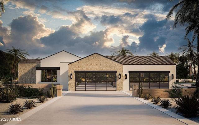 5636 E Caballo Dr, Paradise Valley, AZ 85253 - modern home with an attached garage, stone siding, and concrete driveway