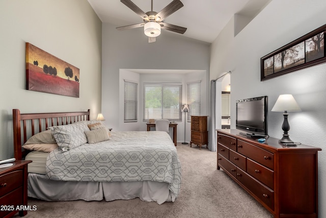 bedroom with a ceiling fan, high vaulted ceiling, and light carpet