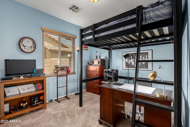 bedroom featuring baseboards, light carpet, and visible vents