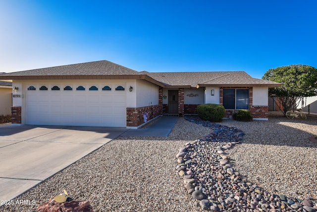 7916 E Naranja Ave, Mesa, AZ 85209 - single story home with brick siding, a garage, concrete driveway, and a shingled roof