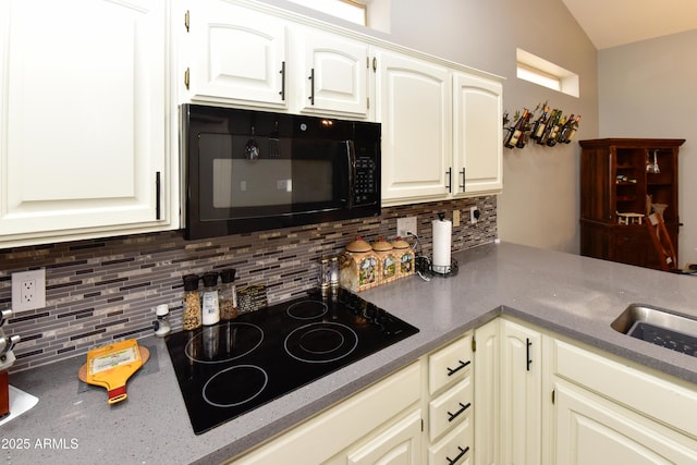 7916 E Naranja Ave, Mesa, AZ 85209 - kitchen featuring black appliances, tasteful backsplash, lofted ceiling, a sink, and white cabinetry