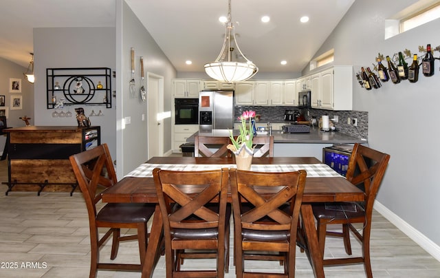 7916 E Naranja Ave, Mesa, AZ 85209 - dining room with lofted ceiling, recessed lighting, and light wood-style floors