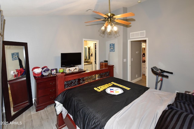7916 E Naranja Ave, Mesa, AZ 85209 - bedroom with vaulted ceiling, a ceiling fan, and light wood-style flooring