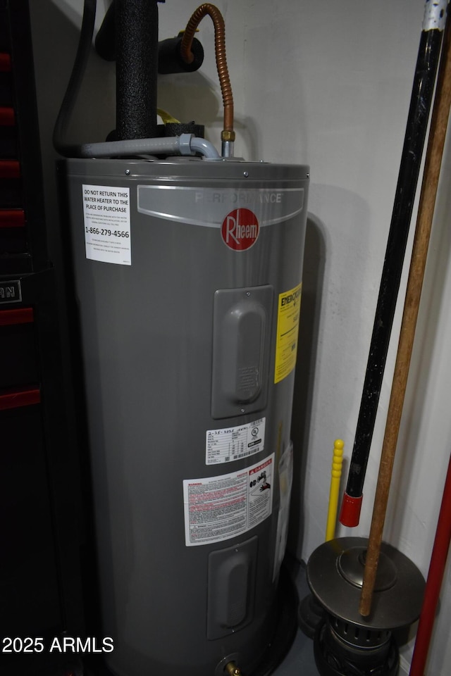 utility room with electric water heater