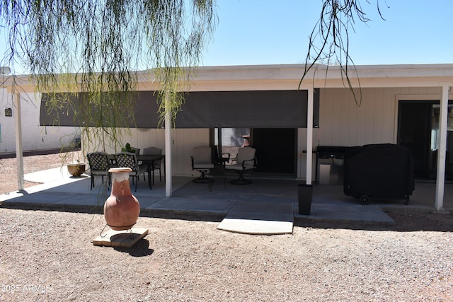 back of house with a patio area