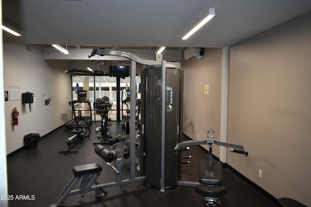 gym with a wall mounted AC