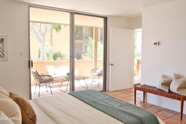 5246 N 20th St Unit B1, Phoenix, AZ 85016 - bedroom with multiple windows, access to exterior, light tile patterned floors, and floor to ceiling windows