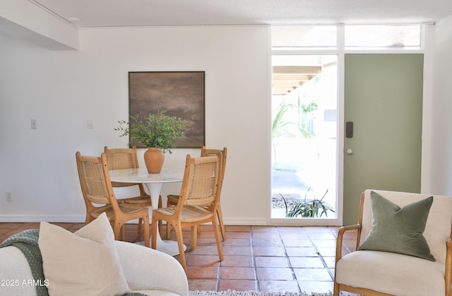 5246 N 20th St Unit B1, Phoenix, AZ 85016 - dining space featuring light tile patterned floors