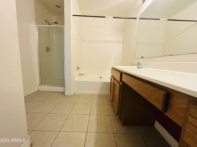 full bathroom with vanity, tile patterned floors, a bathing tub, and a stall shower