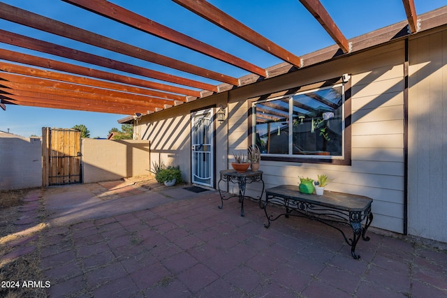 view of patio featuring a pergola