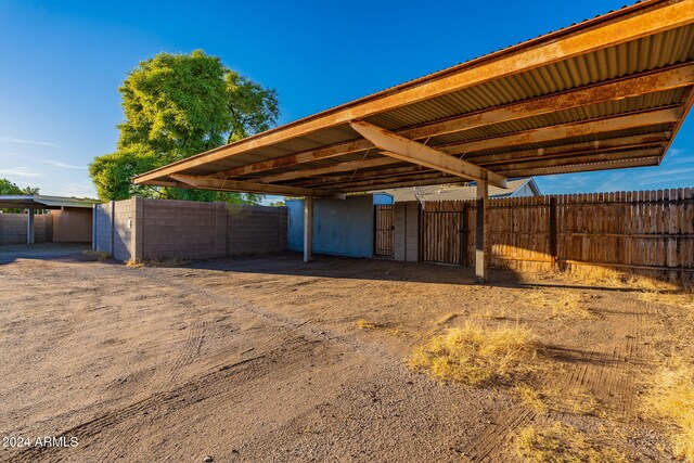 view of car parking with a carport