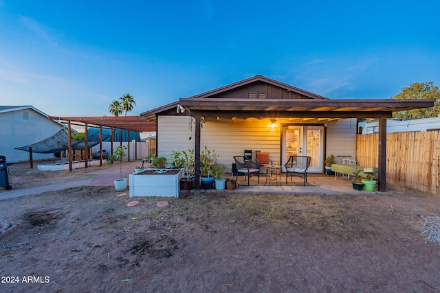 back of house featuring a patio area