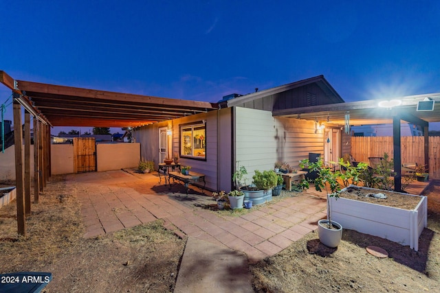 back of property featuring a patio area