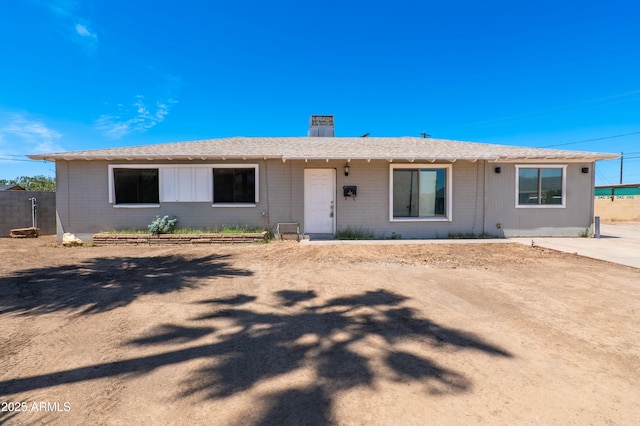 3212 N 49th Ln, Phoenix, AZ 85031 - ranch-style house with a chimney and brick siding