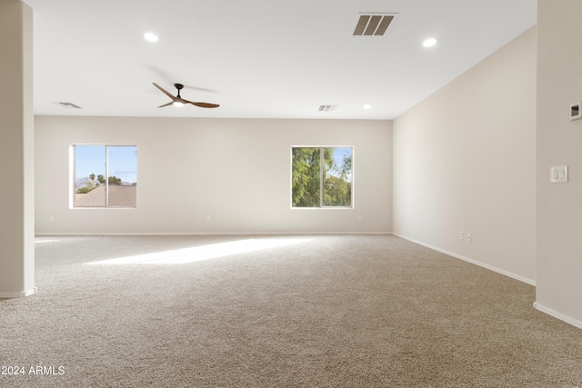 carpeted empty room with ceiling fan