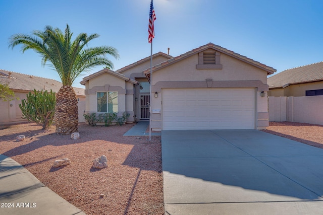 view of front of property featuring a garage