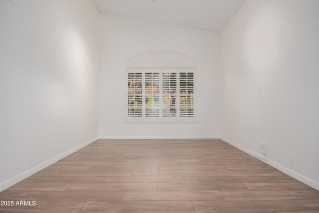 14056 E Desert Cove Ave, Scottsdale, AZ 85259 - empty room with wood finished floors and baseboards