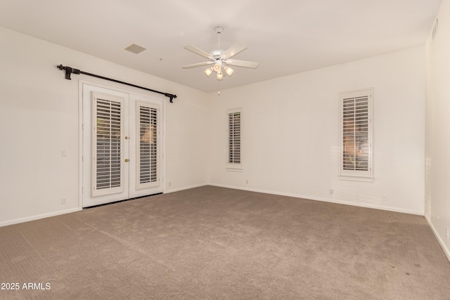 14056 E Desert Cove Ave, Scottsdale, AZ 85259 - empty room with carpet flooring, a ceiling fan, french doors, and baseboards