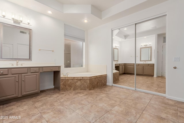14056 E Desert Cove Ave, Scottsdale, AZ 85259 - full bath featuring two vanities, recessed lighting, a garden tub, tile patterned floors, and a tray ceiling