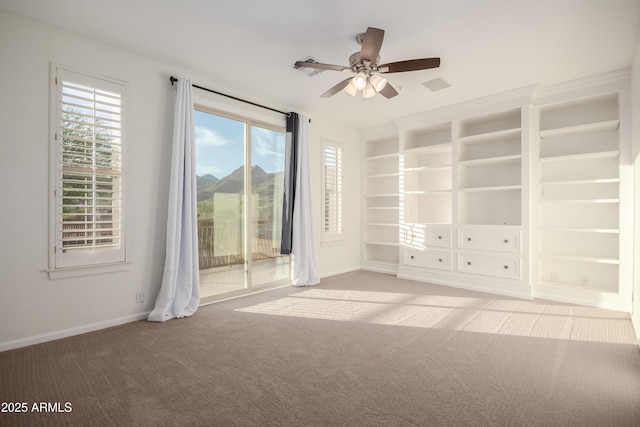 14056 E Desert Cove Ave, Scottsdale, AZ 85259 - unfurnished room with carpet, ceiling fan, healthy amount of natural light, and baseboards