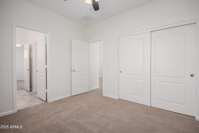 14056 E Desert Cove Ave, Scottsdale, AZ 85259 - unfurnished bedroom with carpet, a closet, ensuite bath, baseboards, and ceiling fan