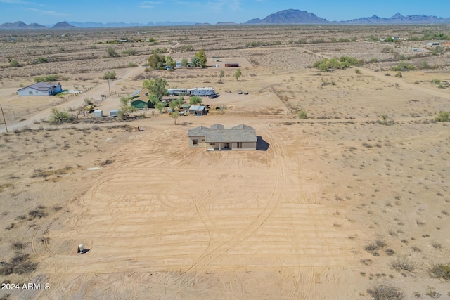 drone / aerial view featuring a mountain view