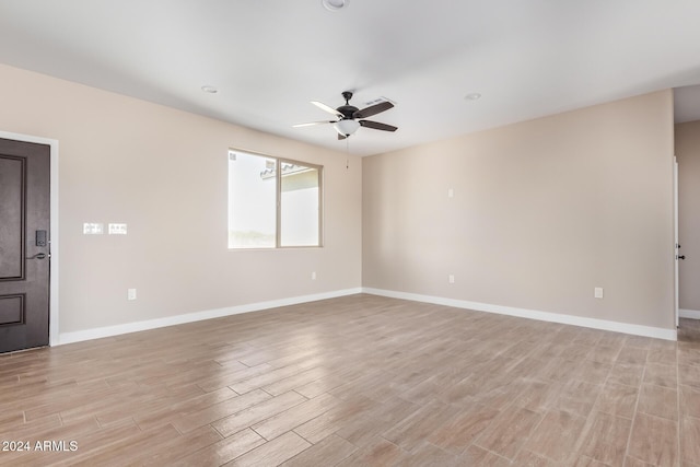 spare room featuring ceiling fan