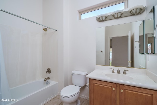 full bathroom featuring vanity, toilet, tub / shower combination, and tile patterned flooring