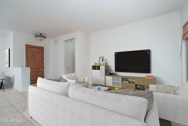 living room with light tile patterned floors