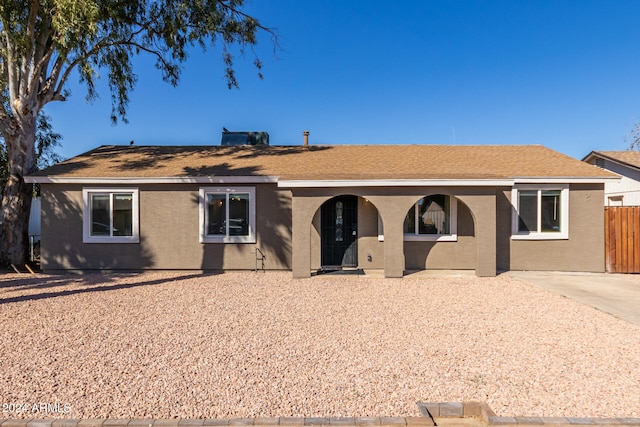 single story home featuring central AC