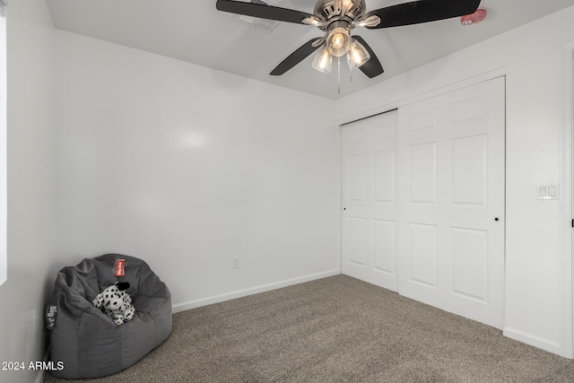 unfurnished room with carpet floors and ceiling fan