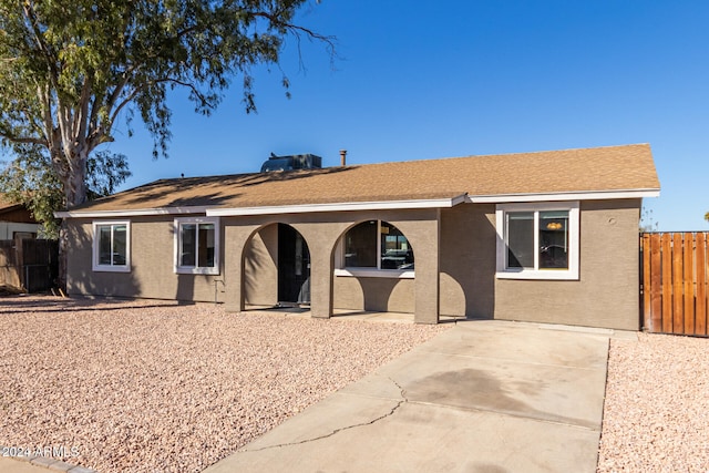 ranch-style house featuring a patio area