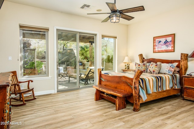 bedroom with light wood-type flooring, access to outside, and ceiling fan