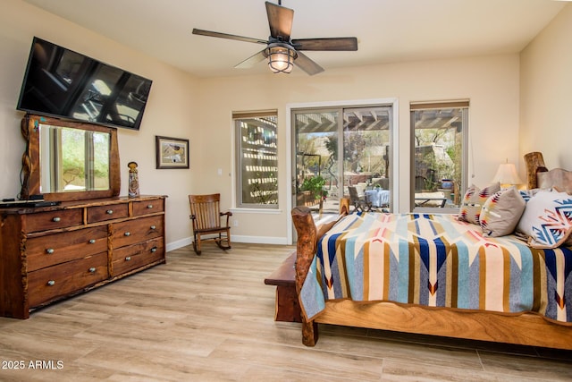 bedroom with light wood-type flooring, access to exterior, and ceiling fan