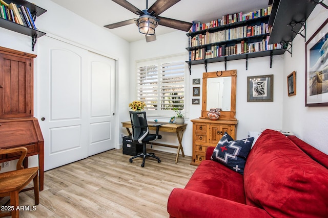 office space featuring ceiling fan and light hardwood / wood-style floors