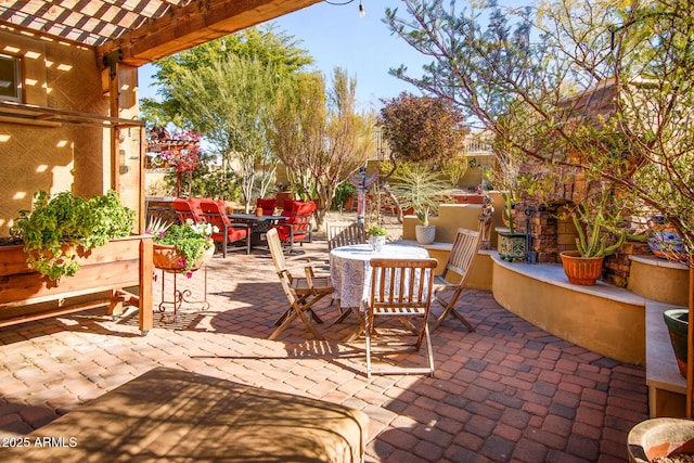 view of patio featuring a pergola