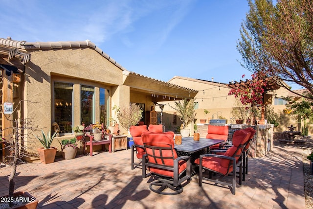 view of patio / terrace featuring exterior bar