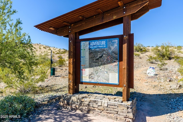 view of gate with a mountain view