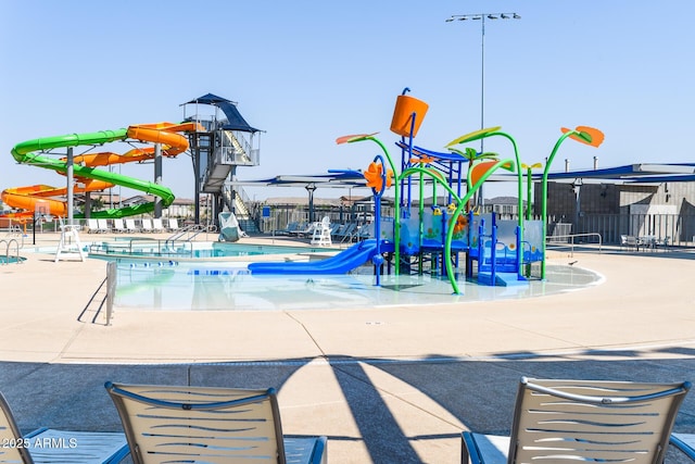 view of play area with a community pool