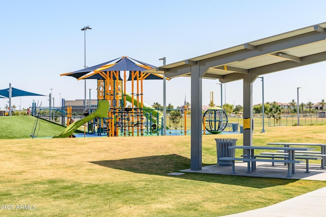 view of playground featuring a lawn