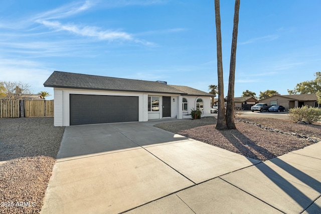 single story home with a garage