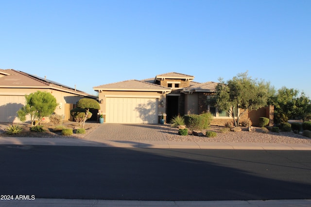 view of front of property featuring a garage