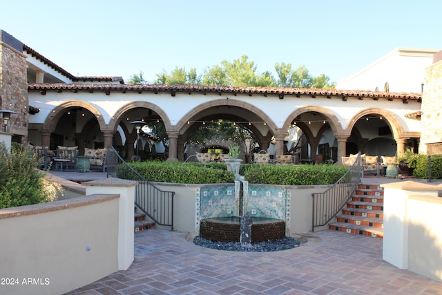 view of property's community with a patio area