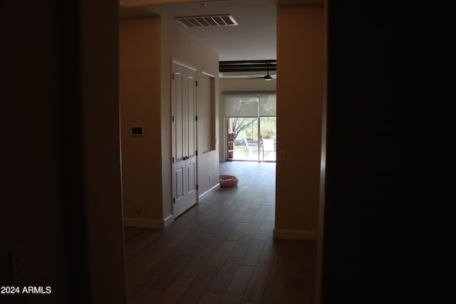 hallway featuring dark hardwood / wood-style floors