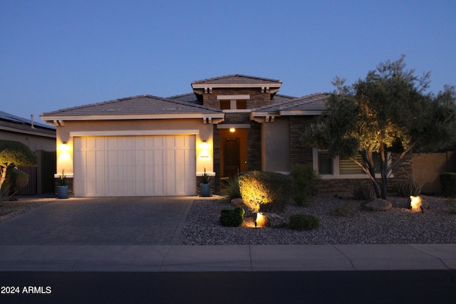 prairie-style house with a garage