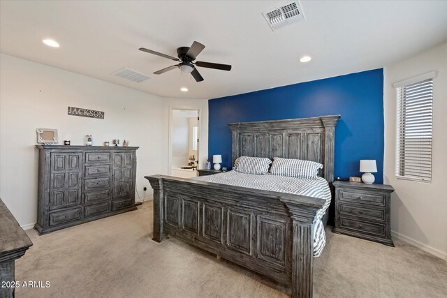 bedroom with visible vents, recessed lighting, and light colored carpet